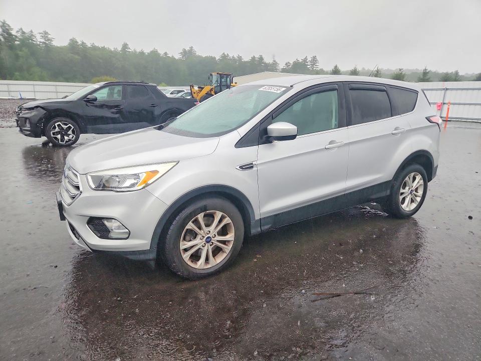 FORD ESCAPE 2017 with VIN 1FMCU9GD9HUD98744 - Photo from auction