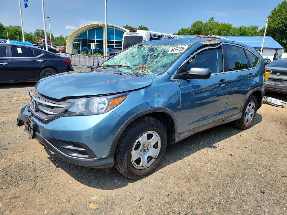 HONDA CR-V 2014 with VIN 2HKRM4H31EH660463 - Photo from auction