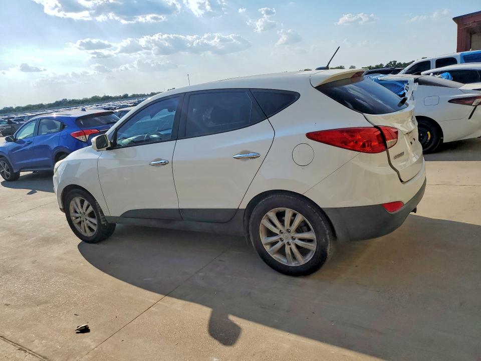 Photo 2 from auction – 2013 HYUNDAI TUCSON with VIN KM8JUCACXDU663735