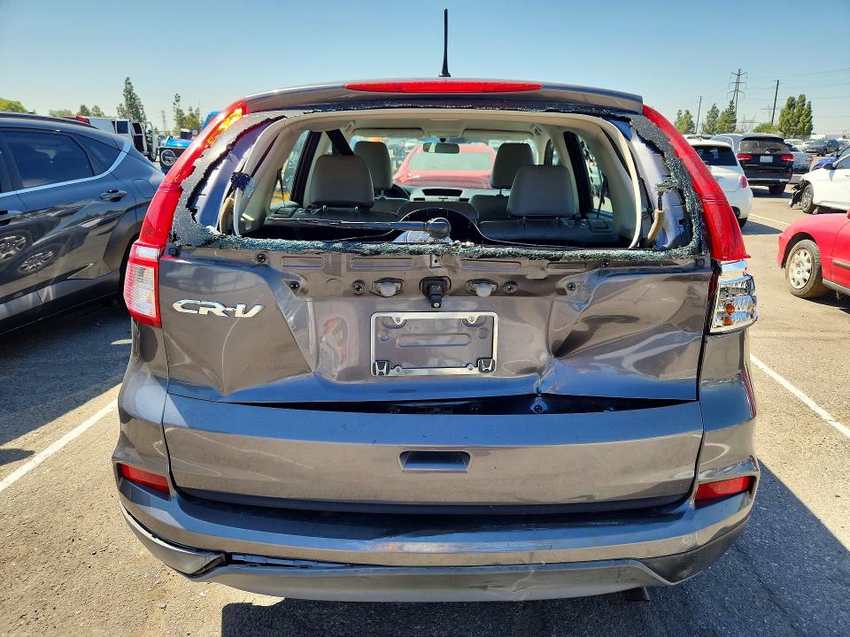 Photo 6 from auction – 2015 HONDA CR-V with VIN 2HKRM3H35FH504700