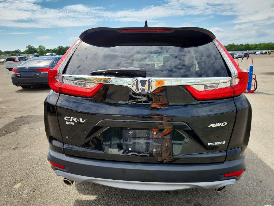Photo 6 from auction – 2018 HONDA CR-V with VIN 7FARW2H94JE034941