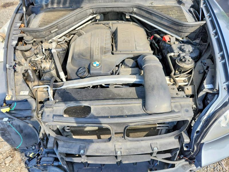 Photo 12 from auction – 2013 BMW X5 with VIN 5UXZV4C57D0E12978
