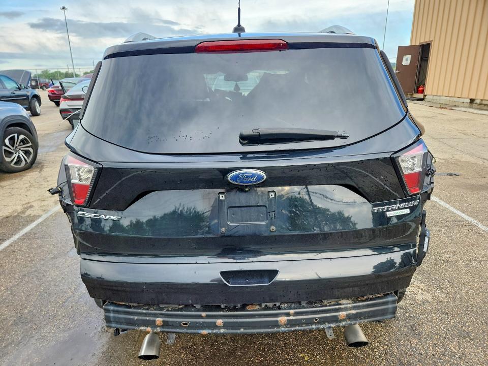 Photo 6 from auction – 2017 FORD ESCAPE with VIN 1FMCU0JD4HUC85286