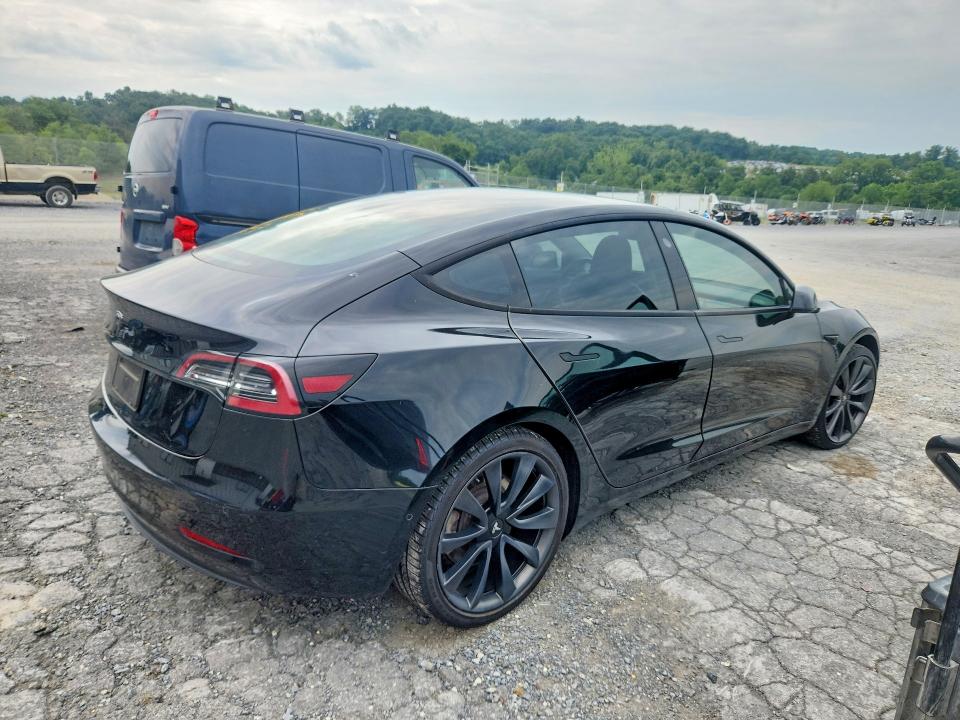 Photo 3 from auction – 2021 TESLA MODEL 3 with VIN 5YJ3E1EAXMF915144