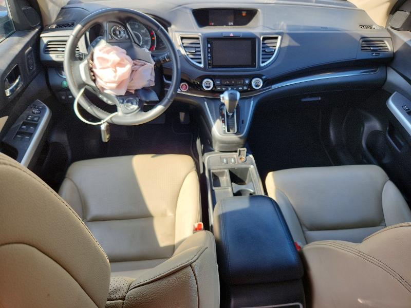 Photo 8 from auction – 2015 HONDA CR-V with VIN 5J6RM4H92FL005143