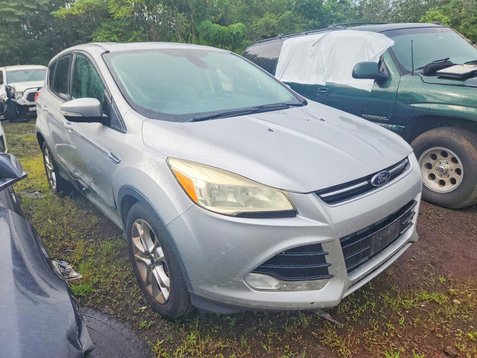 Photo 4 from auction – 2013 FORD ESCAPE with VIN 1FMCU0H96DUC57064