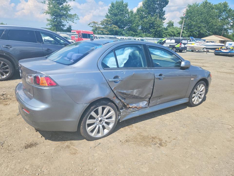 Photo 3 from auction – 2014 MITSUBISHI LANCER with VIN JA32U2FU5EU002618