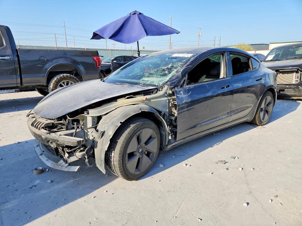TESLA MODEL 3 2022 with VIN 5YJ3E1EB7NF266512 - Photo from auction