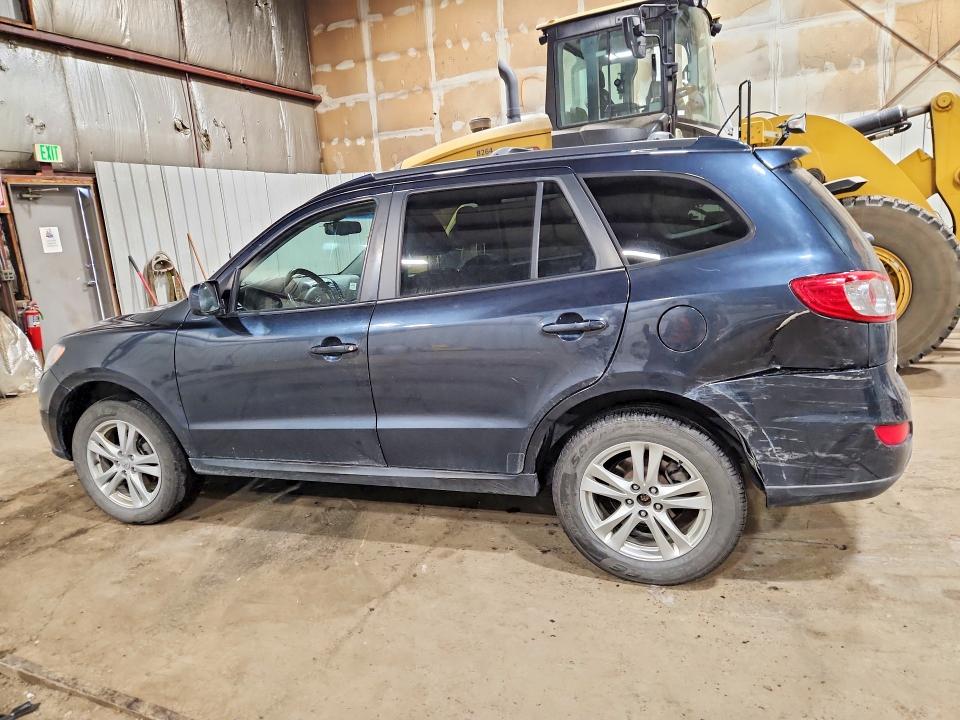 Photo 2 from auction – 2012 HYUNDAI SANTA FE with VIN 5XYZHDAG0CG097976