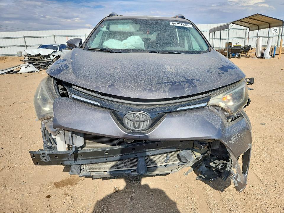 Photo 5 from auction – 2016 TOYOTA RAV4 with VIN 2T3WFREV9GW302071