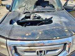 Photo 12 from auction – 2009 HONDA PILOT with VIN 5FNYF38919B009147
