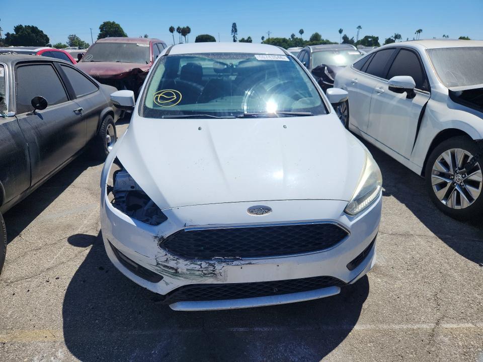Photo 5 from auction – 2016 FORD FOCUS with VIN 1FADP3F26GL306299