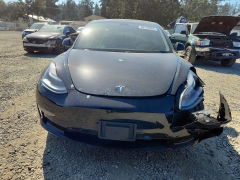 Foto 5 de la subasta – 2021 TESLA MODEL 3 con VIN 5YJ3E1EA0MF908347