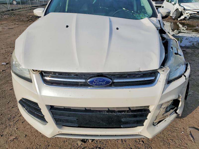 Photo 12 from auction – 2013 FORD ESCAPE with VIN 1FMCU9H98DUD06933