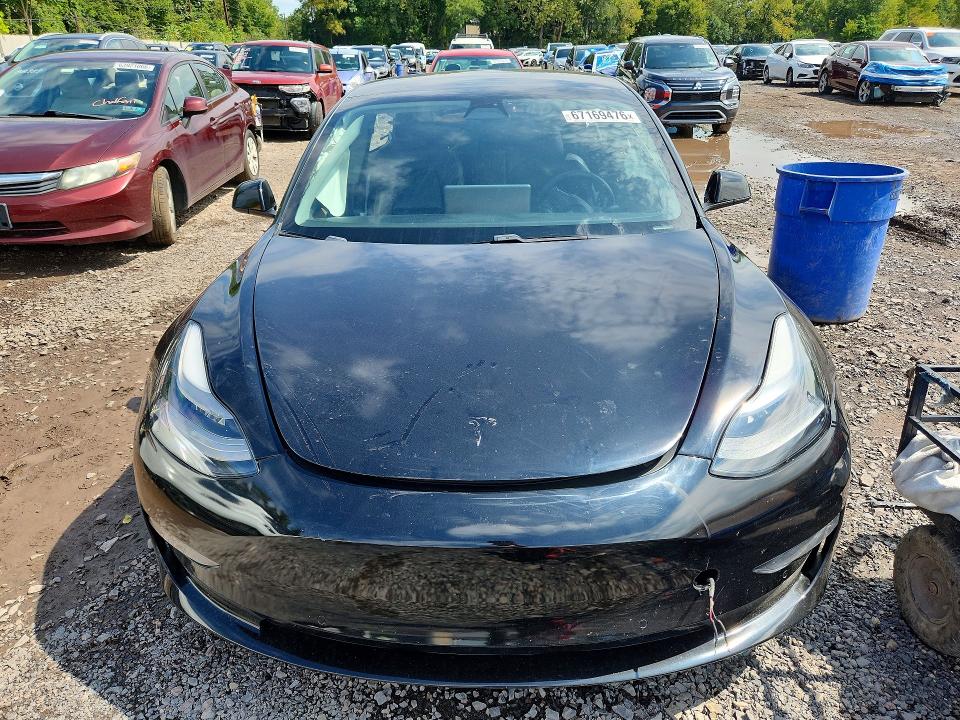 Photo 5 from auction – 2021 TESLA MODEL 3 with VIN 5YJ3E1EA8MF029050
