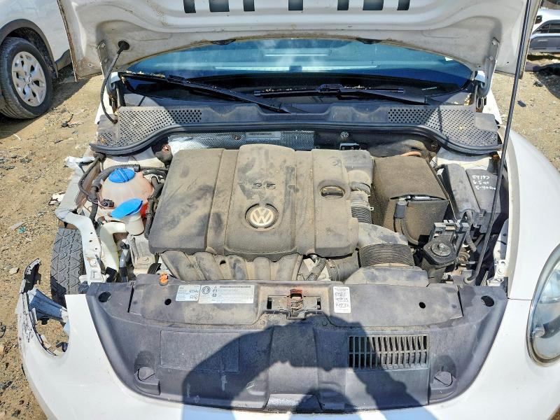Photo 11 from auction – 2012 VOLKSWAGEN BEETLE with VIN 3VWHP7AT5CM622575