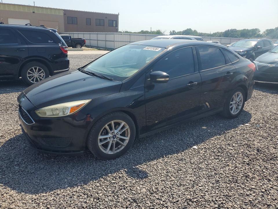 FORD FOCUS 2016 with VIN 1FADP3F20GL323874 - Photo from auction