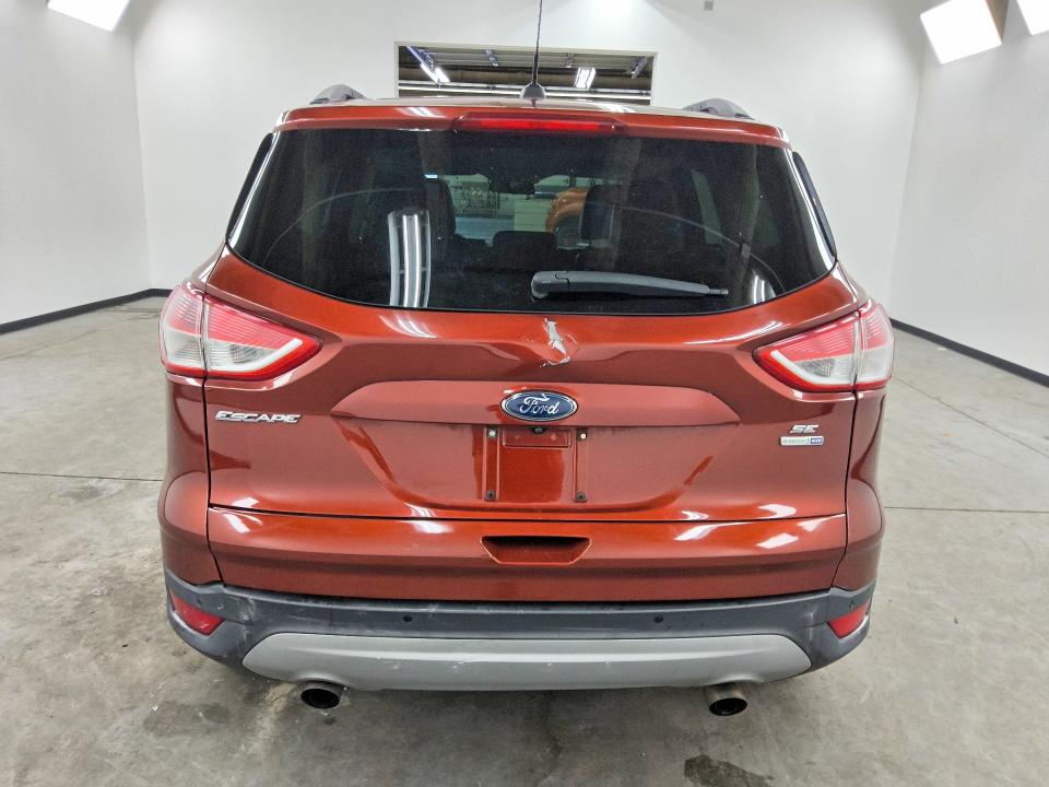 Photo 6 from auction – 2016 FORD ESCAPE with VIN 1FMCU9GX0GUC40107