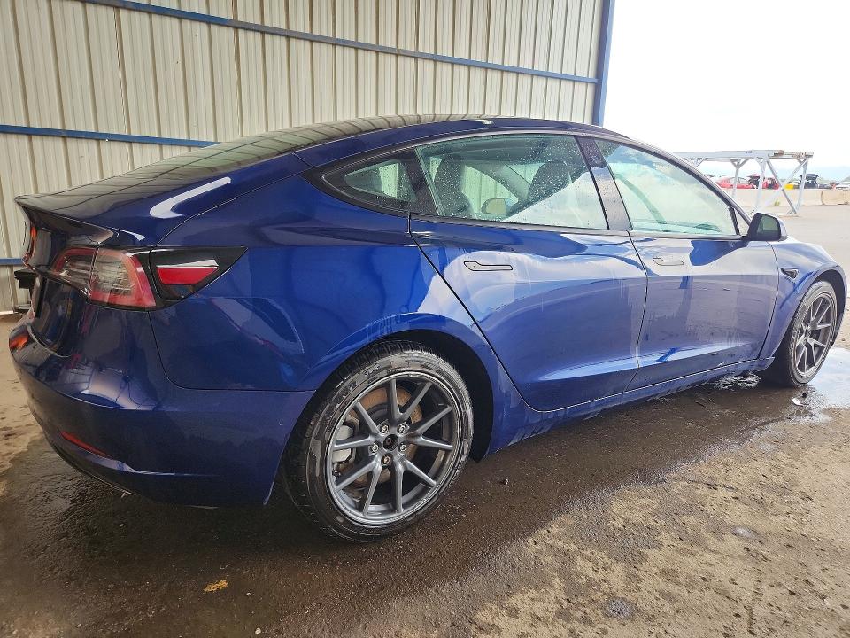 Photo 3 from auction – 2022 TESLA MODEL 3 with VIN 5YJ3E1EA3NF189967