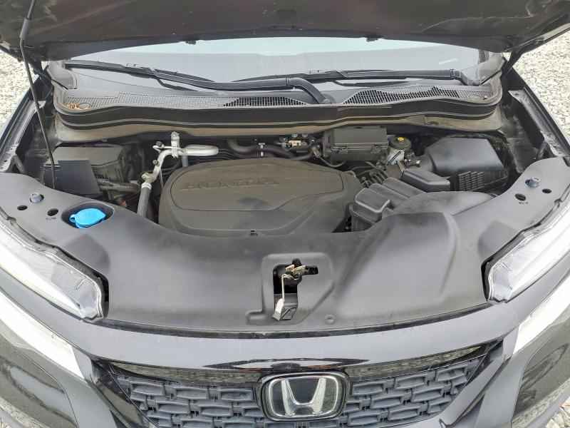 Photo 12 from auction – 2021 HONDA PASSPORT with VIN 5FNYF7H99MB010546