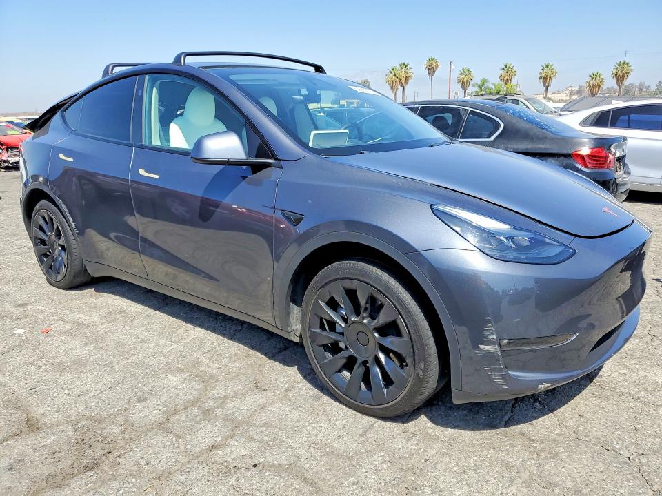 Снимка 4 от търг – 2023 TESLA MODEL Y с VIN 7SAYGDEE9PF868166