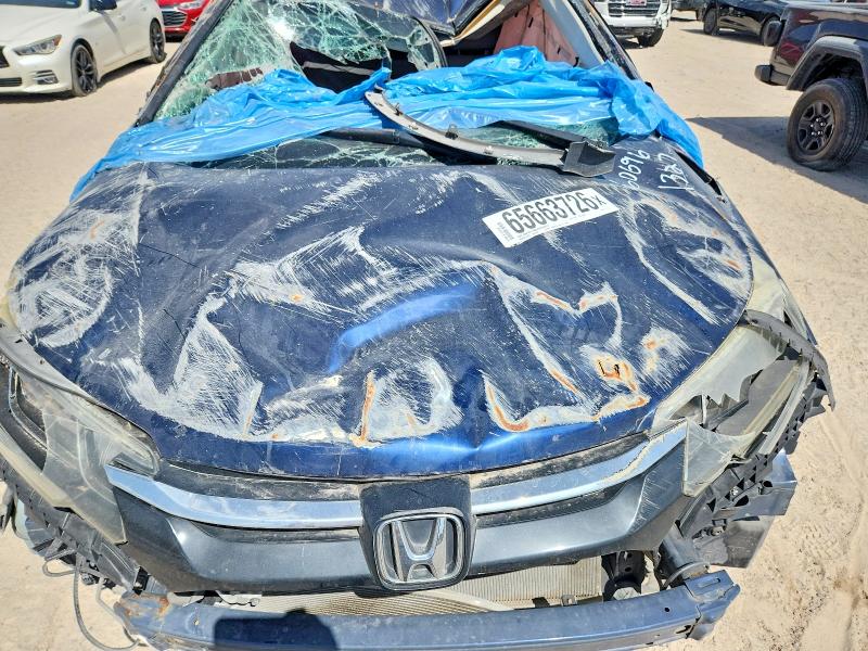 Photo 11 from auction – 2016 HONDA CR-V with VIN 3CZRM3H51GG721571