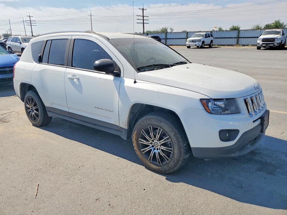 Photo 4 from auction – 2014 JEEP COMPASS with VIN 1C4NJCBA4ED777100