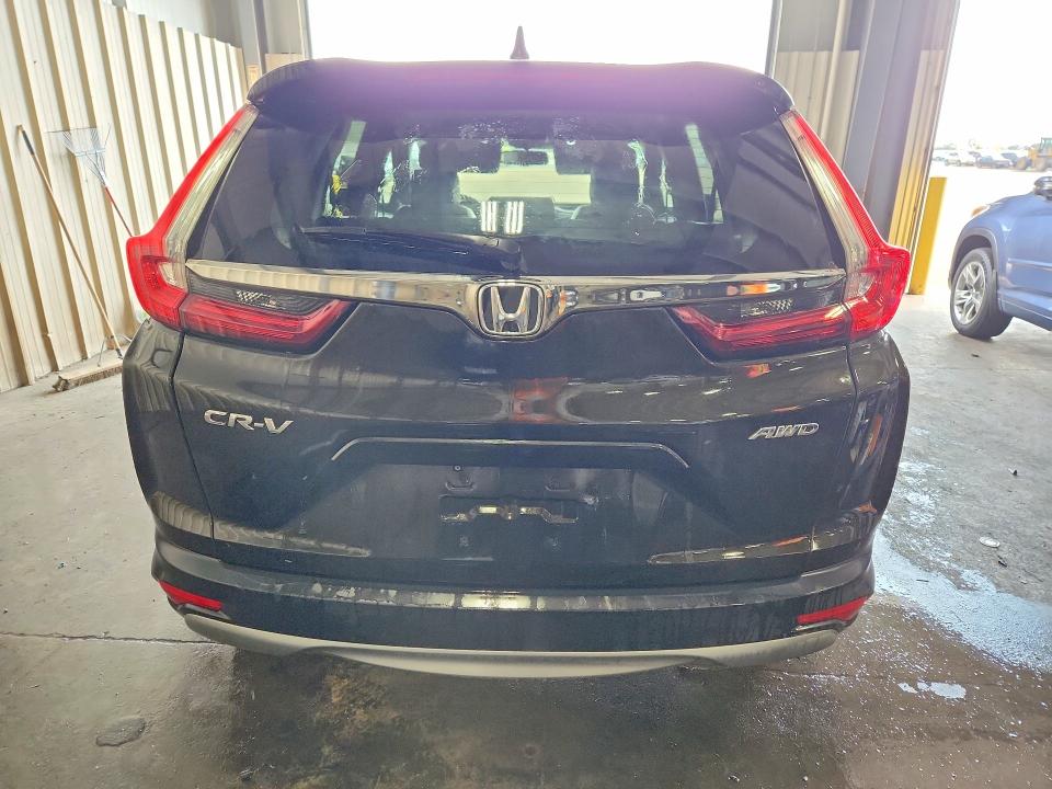 Photo 6 from auction – 2018 HONDA CR-V with VIN 7FARW2H8XJE009842