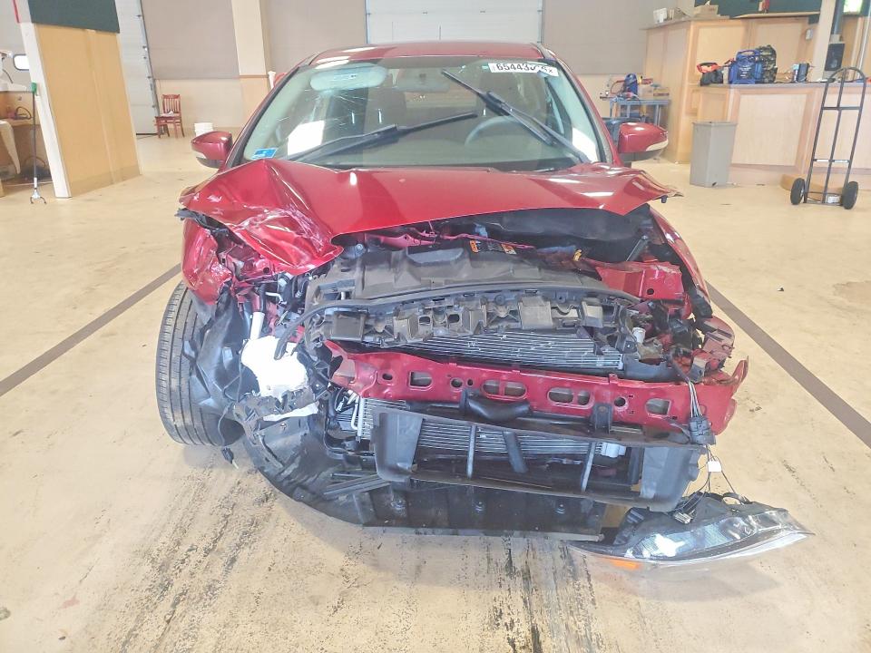Photo 5 from auction – 2016 FORD FOCUS with VIN 1FADP3F29GL206696