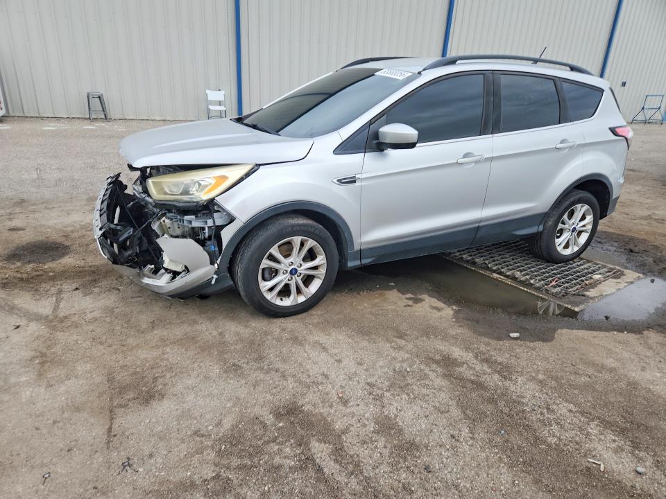 FORD ESCAPE 2018 with VIN 1FMCU9HD1JUB34003 - Photo from auction