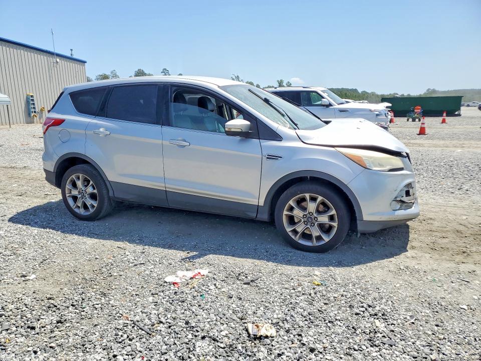 Photo 4 from auction – 2013 FORD ESCAPE with VIN 1FMCU0H92DUC51911