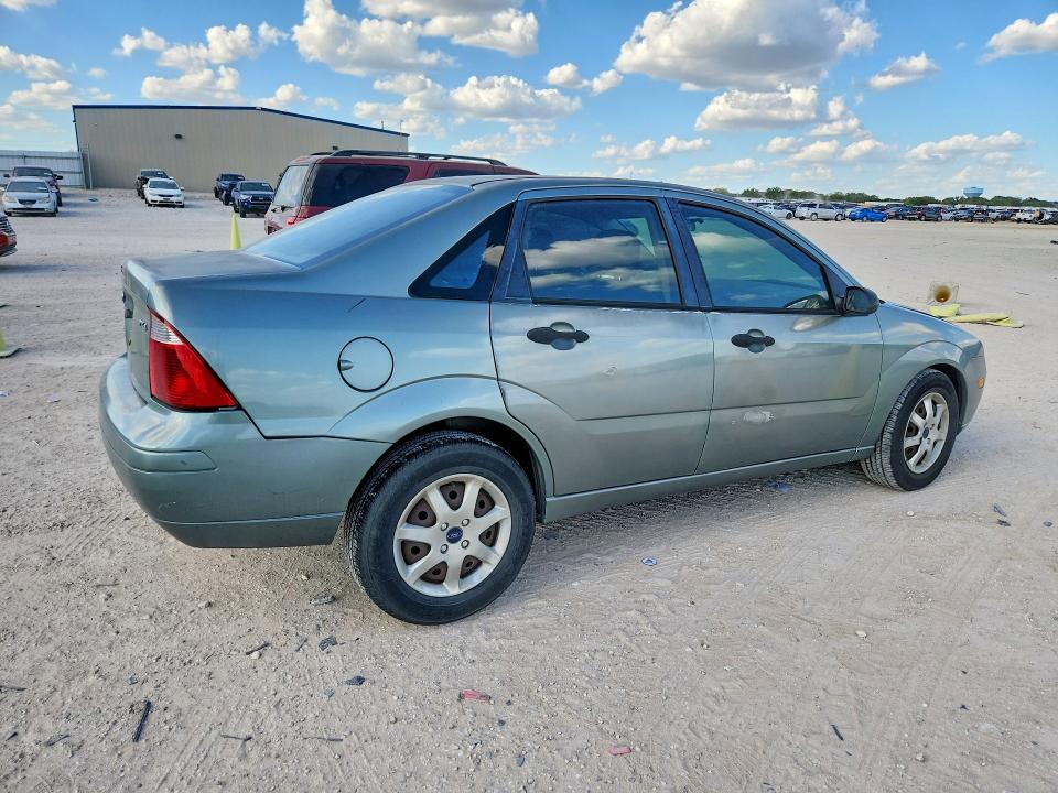 Фото 3 с аукциона – 2005 FORD FOCUS с VIN 1FAFP34NX5W272448