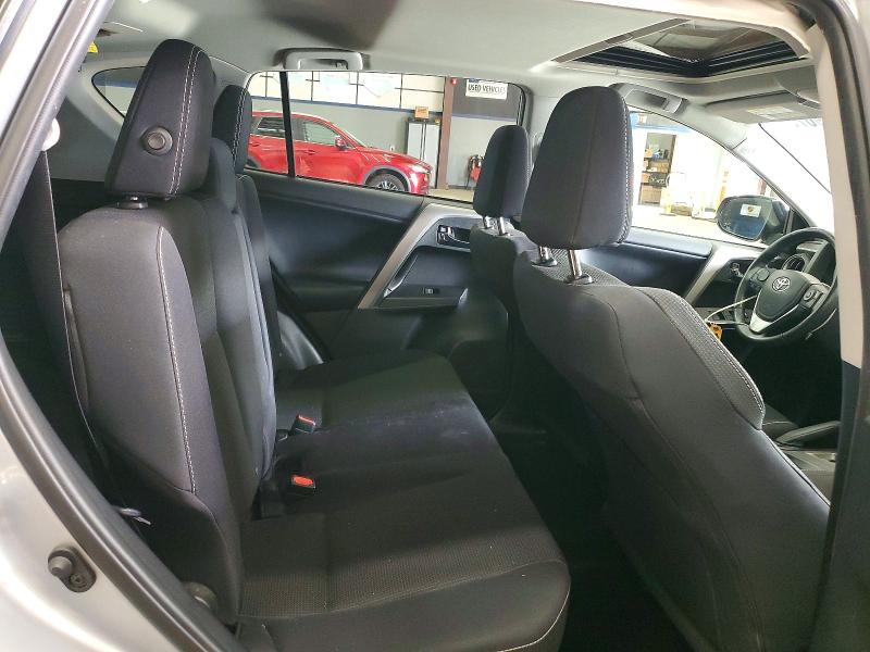 Photo 11 from auction – 2018 TOYOTA RAV4 with VIN 2T3RFREV3JW796397