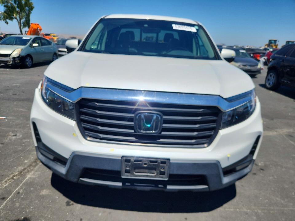 Photo 5 from auction – 2022 HONDA RIDGELINE with VIN 5FPYK3F58NB038853