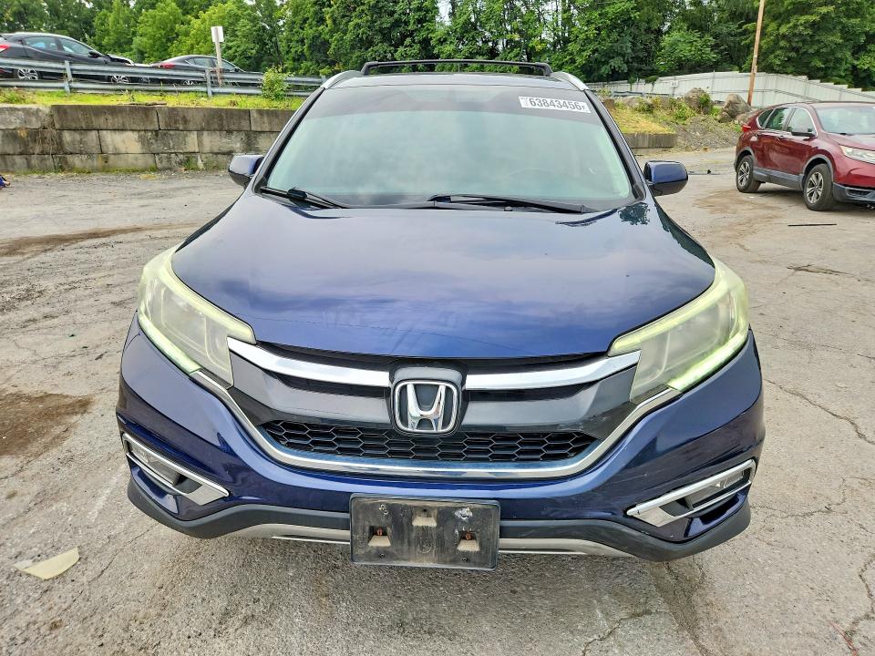 Photo 5 from auction – 2016 HONDA CR-V with VIN 2HKRM4H73GH705375