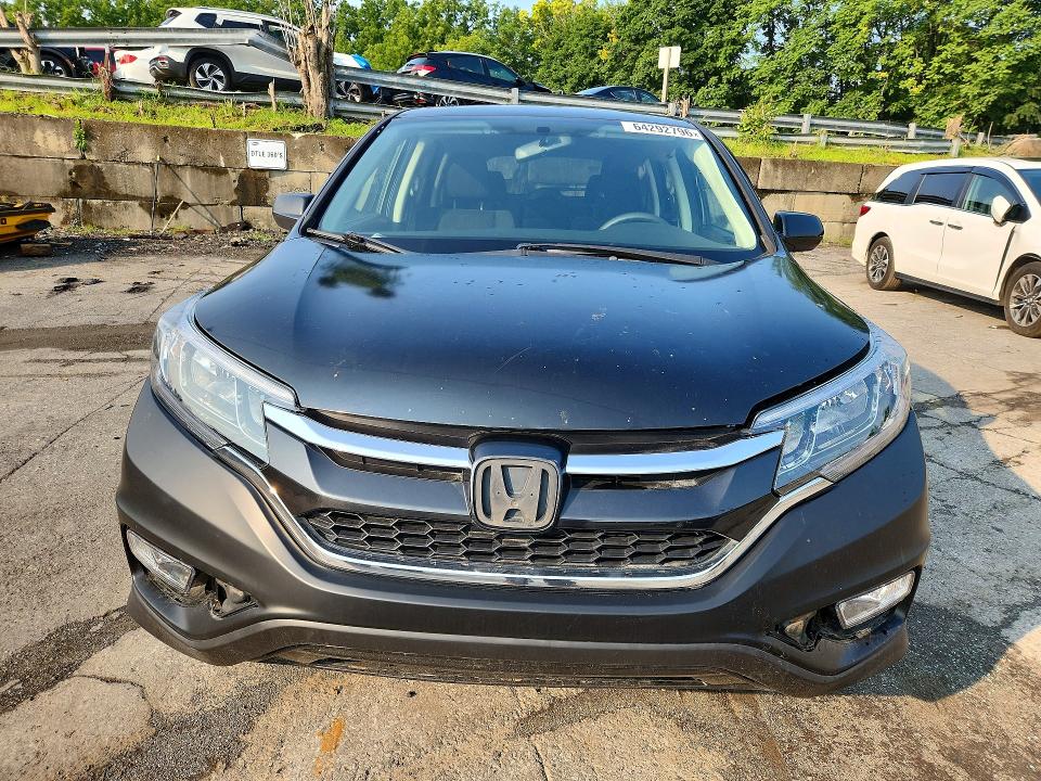 Photo 5 from auction – 2015 HONDA CR-V with VIN 2HKRM3H57FH519247