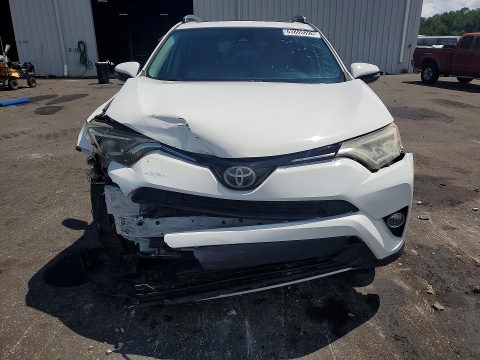 Photo 5 from auction – 2017 TOYOTA RAV4 with VIN JTMWFREV4HJ708873