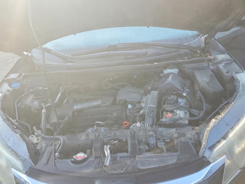 Photo 12 from auction – 2015 HONDA CR-V with VIN 5J6RM4H38FL038580