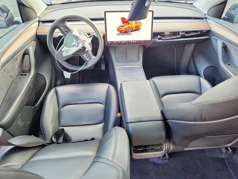 Photo 8 from auction – 2023 TESLA MODEL Y with VIN 7SAYGAEE2PF694780