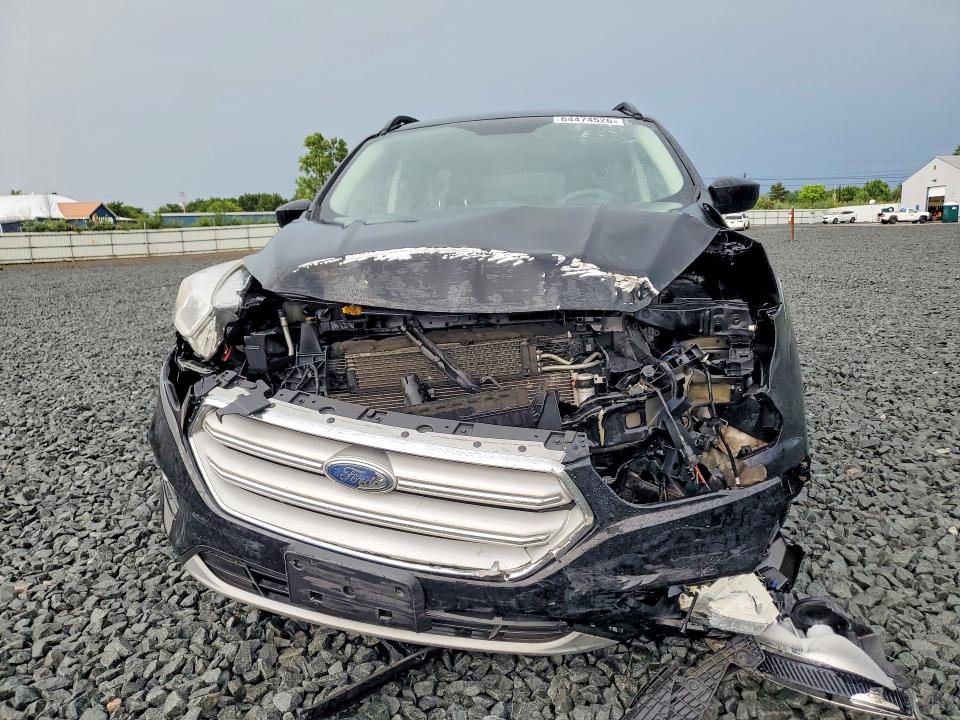 Photo 5 from auction – 2018 FORD ESCAPE with VIN 1FMCU9GD0JUB29182