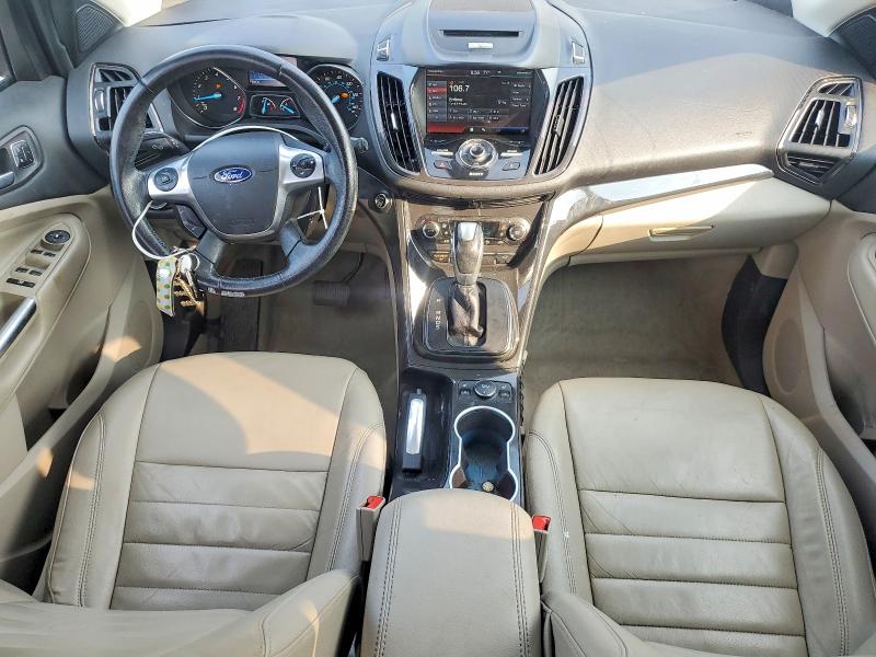 Photo 8 from auction – 2015 FORD ESCAPE with VIN 1FMCU0J99FUA69023