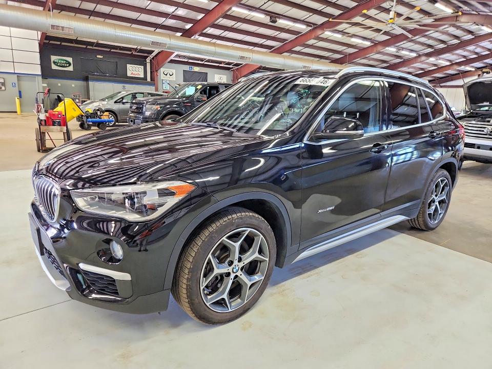 BMW X1 2017 with VIN WBXHT3C37H5F85875 - Photo from auction