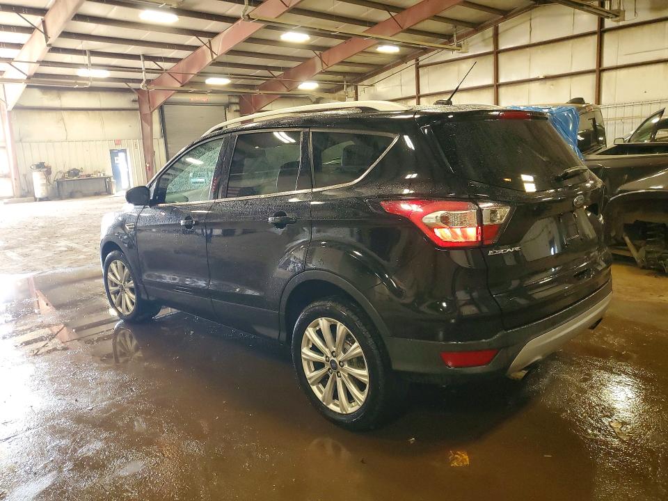 Photo 2 from auction – 2017 FORD ESCAPE with VIN 1FMCU9J90HUE10252