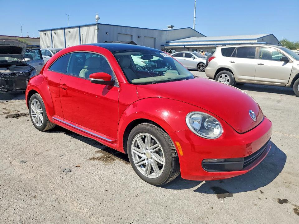 Photo 4 from auction – 2013 VOLKSWAGEN BEETLE with VIN 3VWJP7AT2DM619636