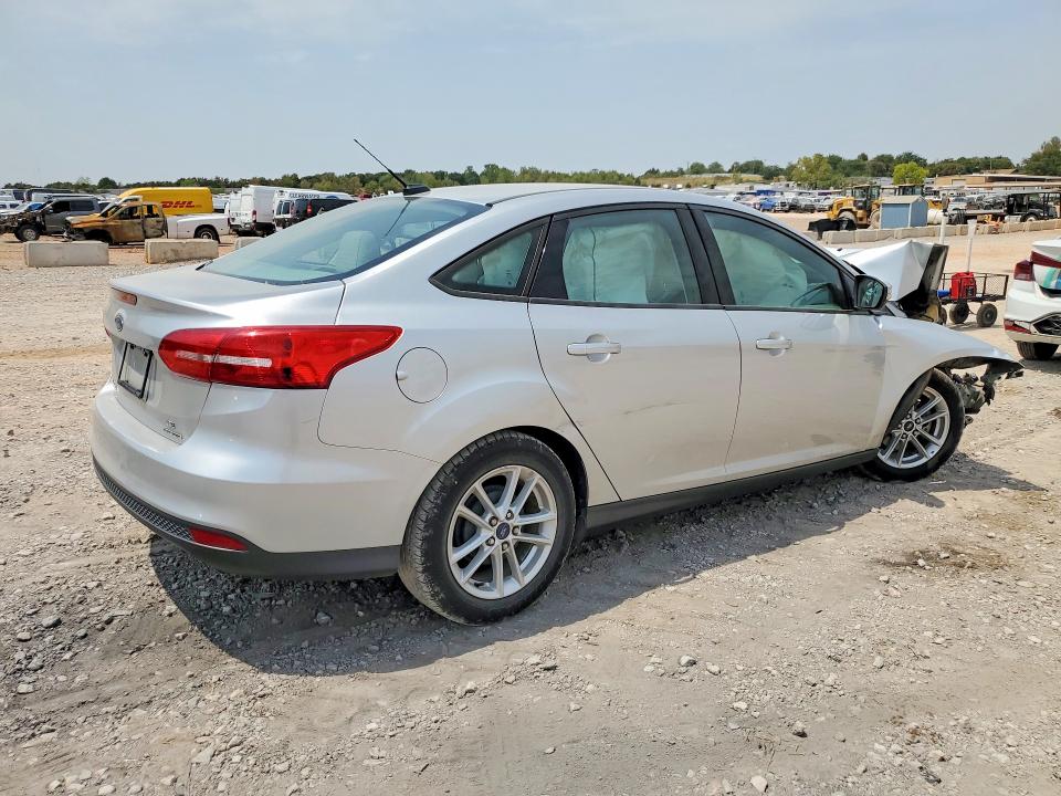 Photo 3 from auction – 2016 FORD FOCUS with VIN 1FADP3F21GL209611
