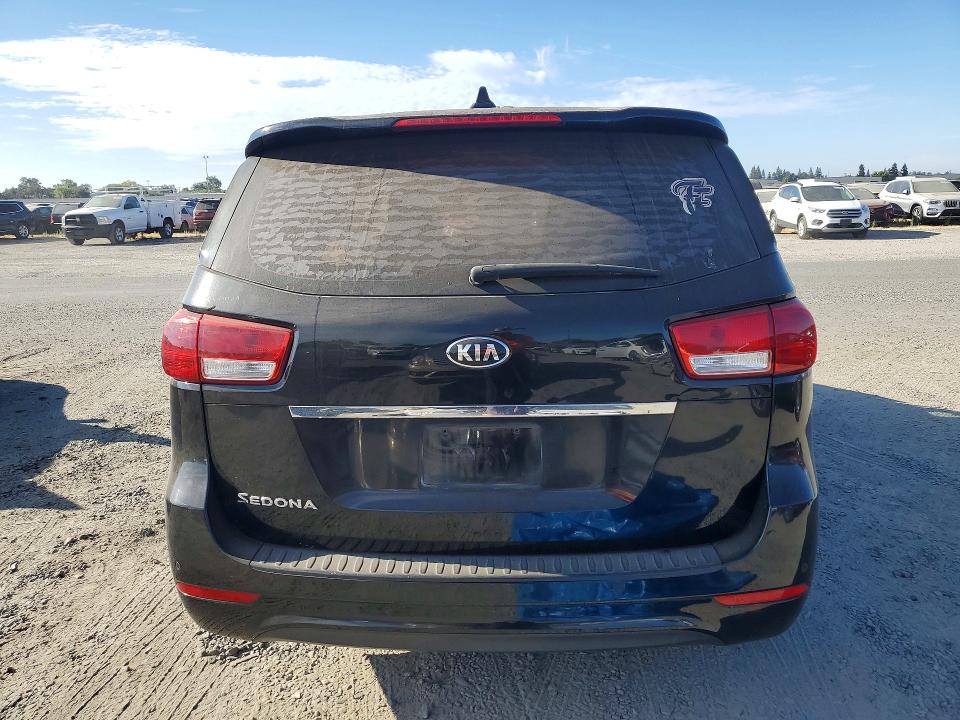 Photo 6 from auction – 2015 KIA SEDONA with VIN KNDMA5C11F6032641