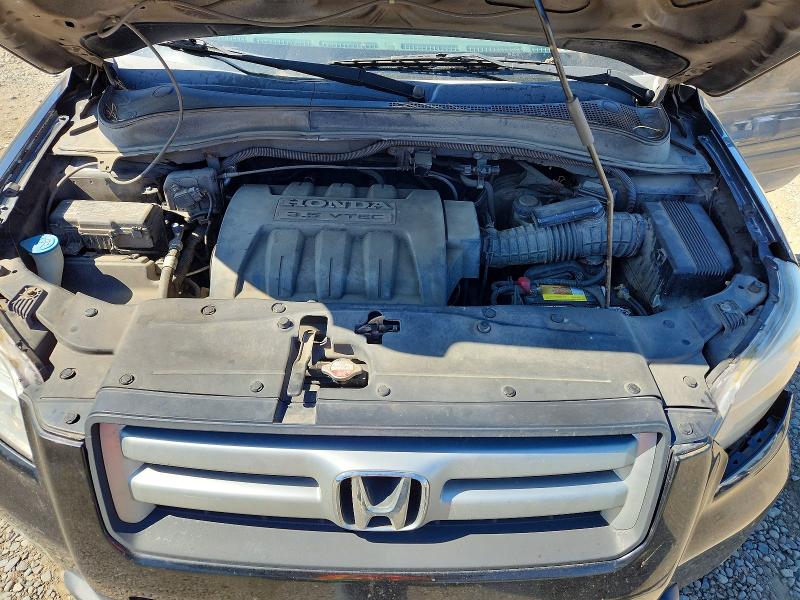 Photo 12 from auction – 2006 HONDA PILOT with VIN 2HKYF18426H534191