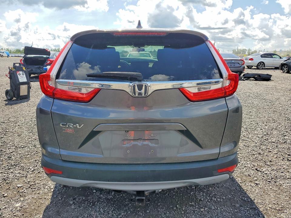Photo 6 from auction – 2017 HONDA CR-V with VIN 2HKRW1H30HH002436