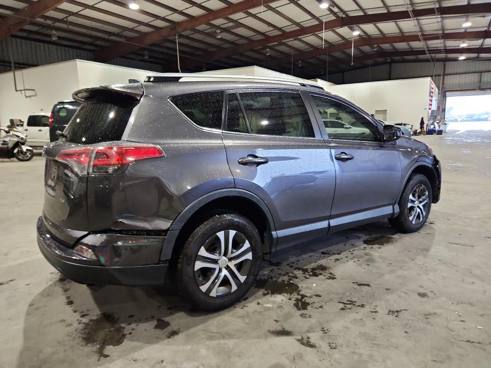 Photo 3 from auction – 2017 TOYOTA RAV4 with VIN JTMZFREV5HJ136130