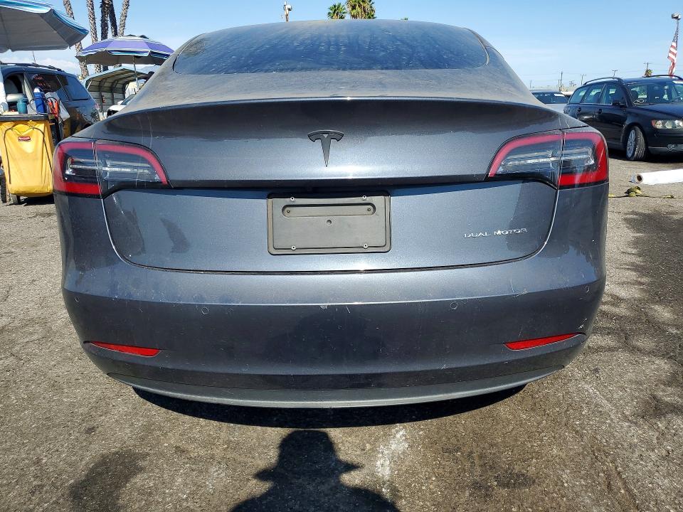Photo 6 from auction – 2022 TESLA MODEL 3 with VIN 5YJ3E1EB7NF166796